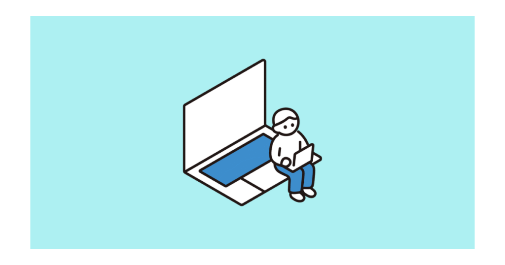 パソコンに座る人